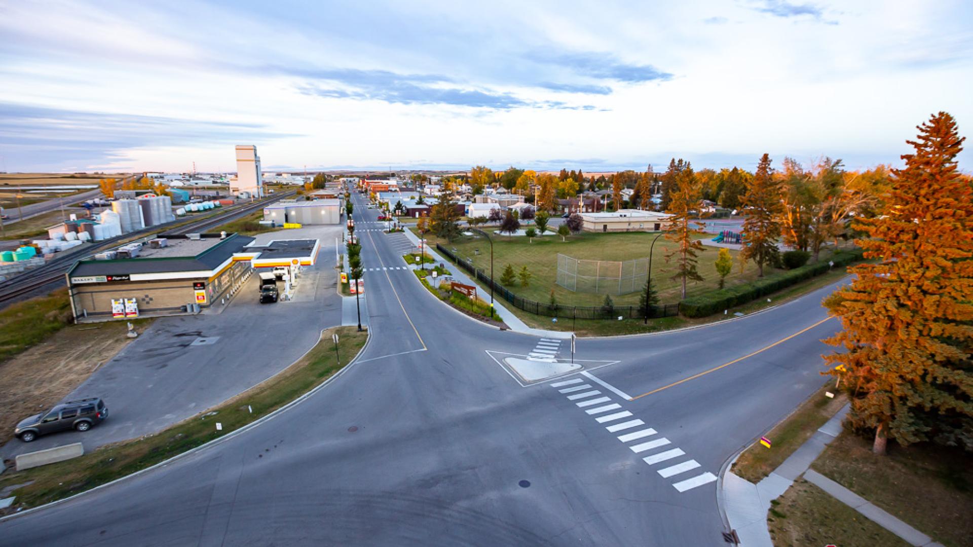 Overlooking a pond at a row of residential homes 