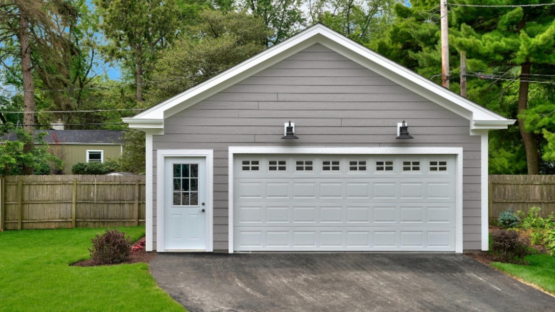 Detached garage in a backyard